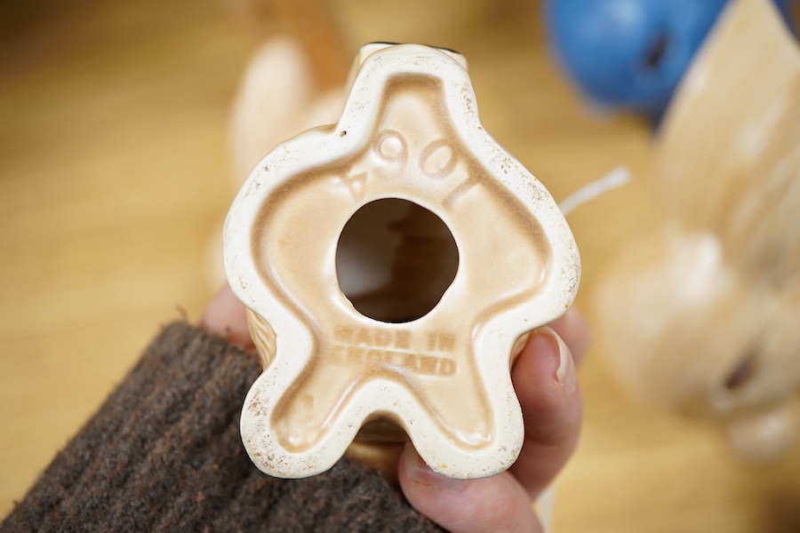 A collection of Sylvac bunny figures, one in the form of a teapot and a pair of dogs, largest 25cm high